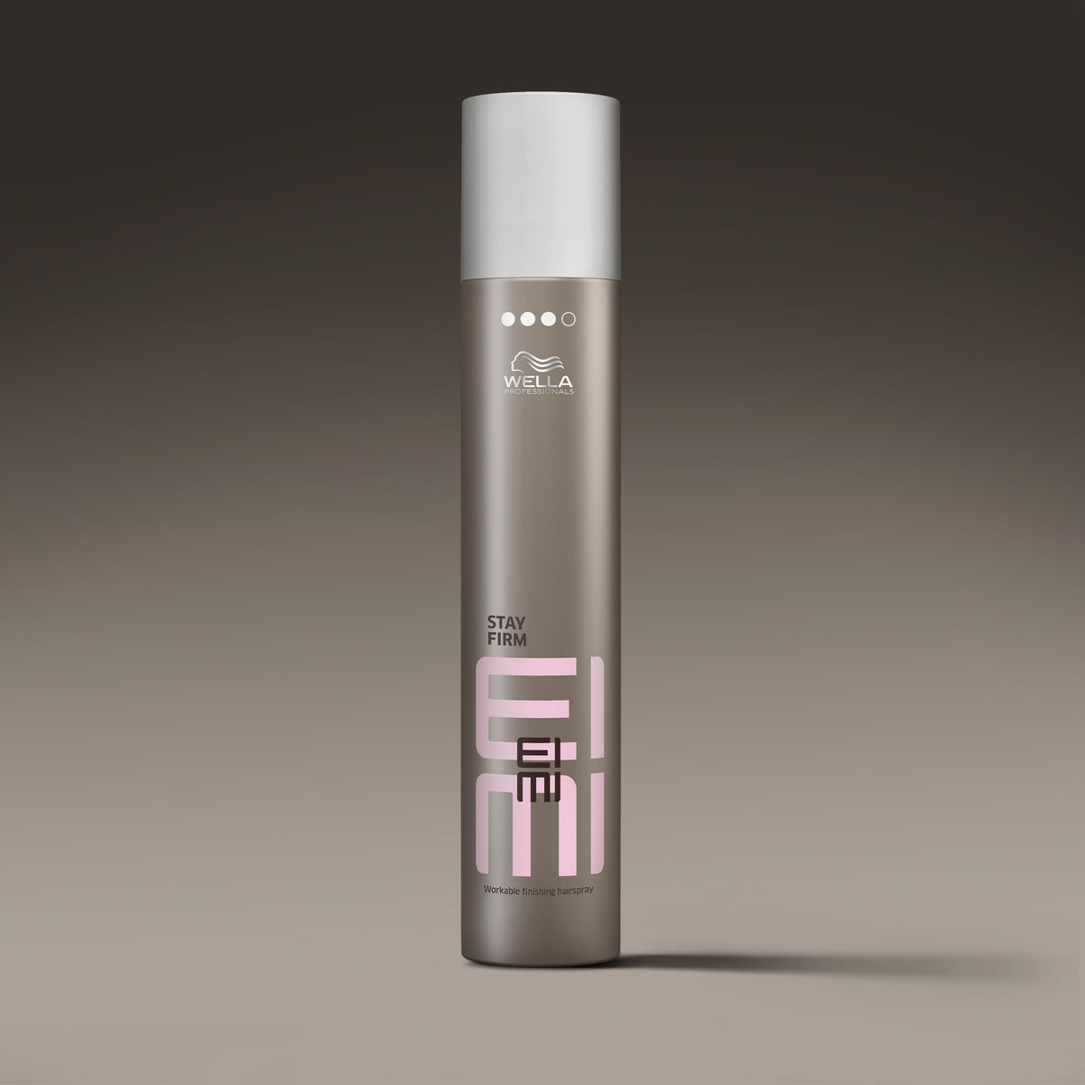 Wella Professionals product next to hand showing 9 oz size for scale