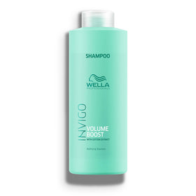 Wella Professionals bottle front view showing volumizing shampoo and brand benefit