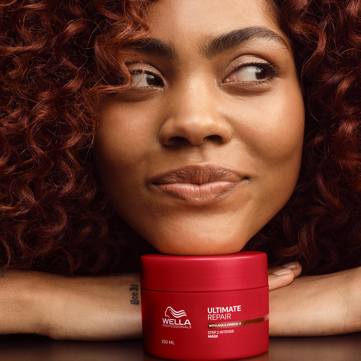 Wella Professionals jar on bathroom shelf suggesting salon-quality routine