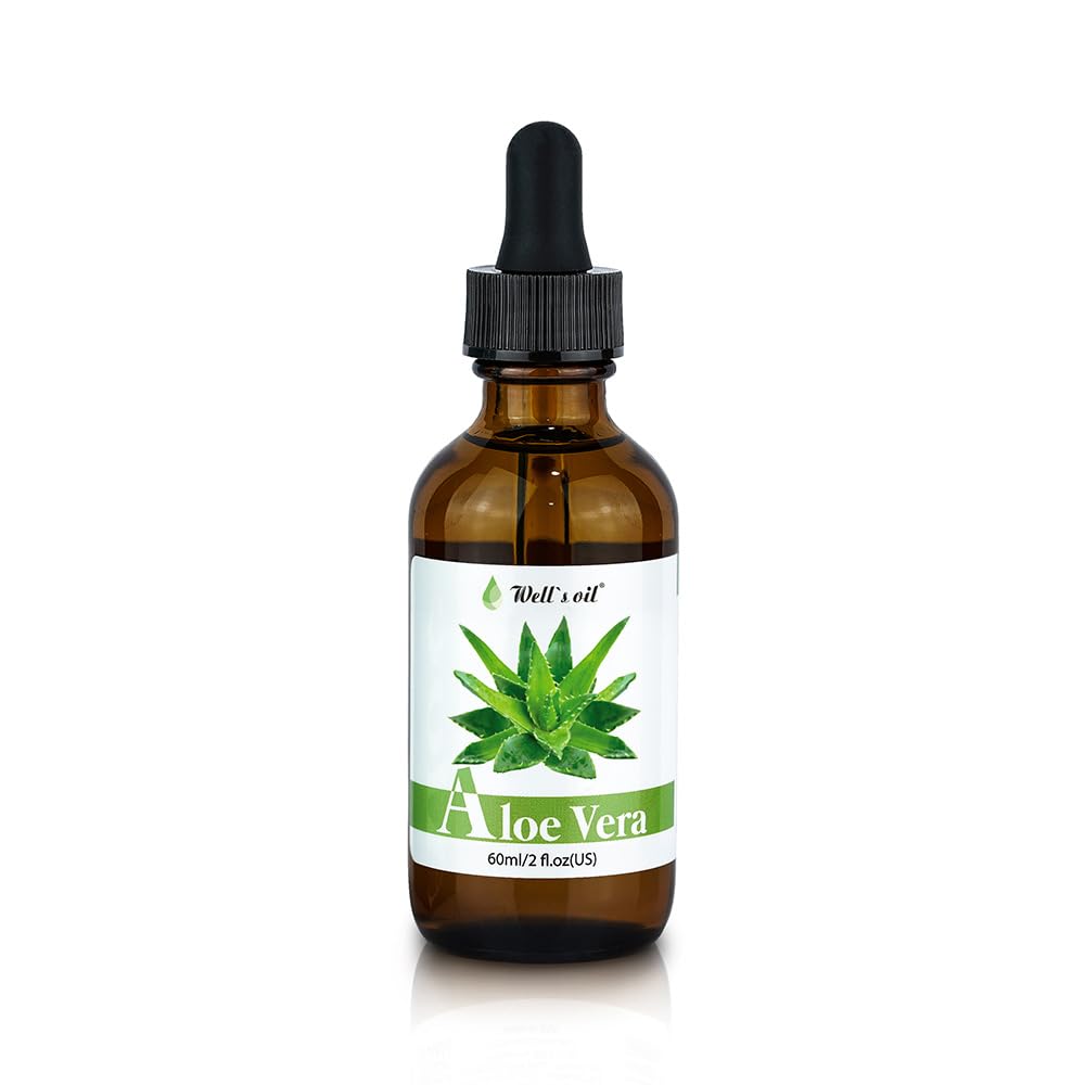 Well's Oil aloe vera oil next to a 2 fl oz scale for size and portability