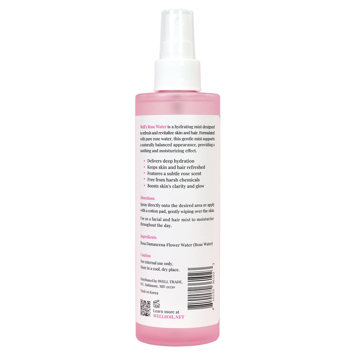 Well's Oil bottle with rose flowers flatlay emphasizing natural Rosa damascena origin
