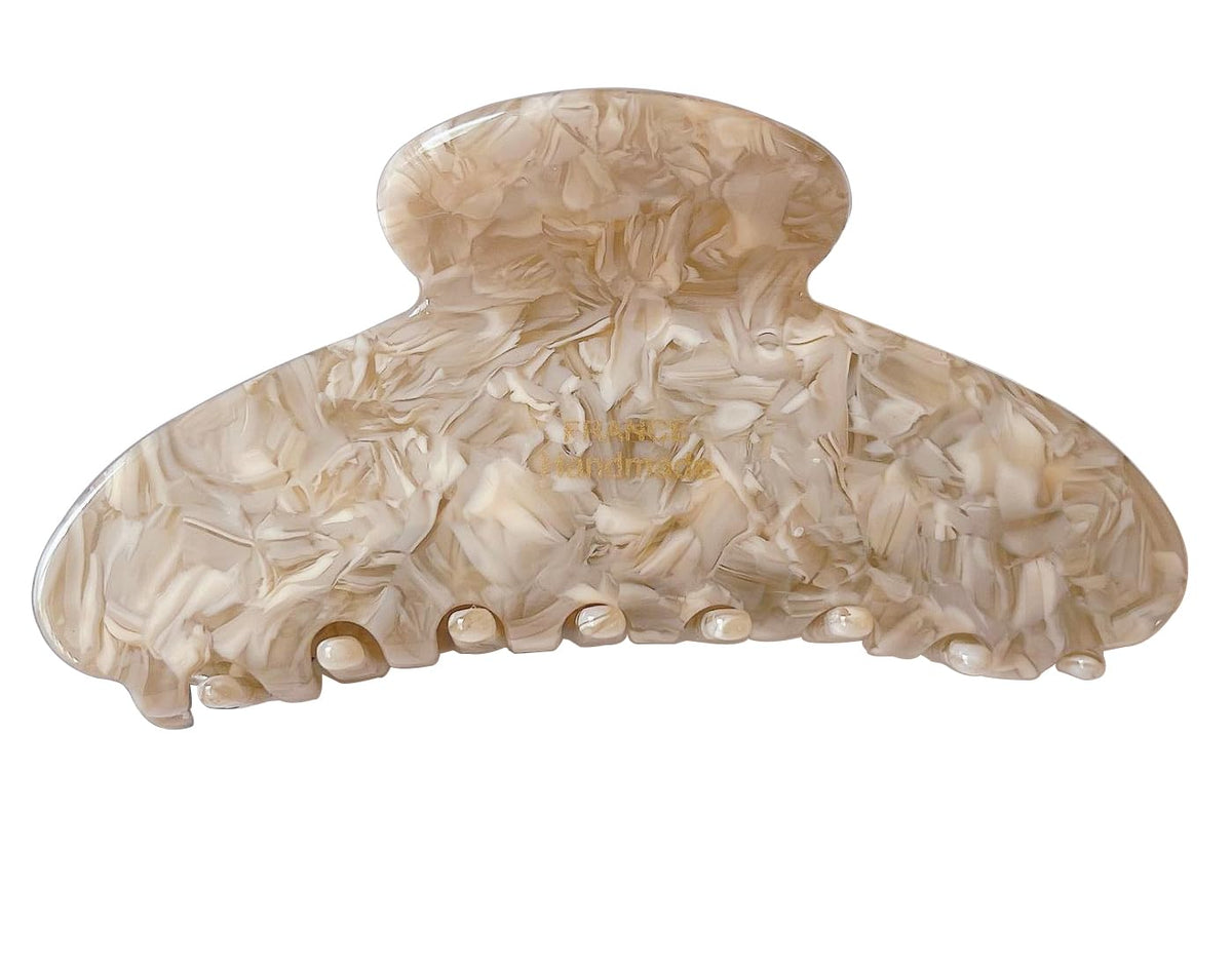 Wenlly front view of tortoise shell clip showing elegant shape and secure hold