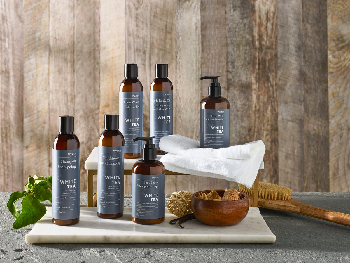 Westin bottle with white tea leaves conveying botanical scent and freshness
