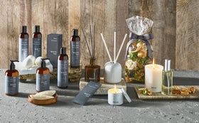 Westin White Tea Aloe set arranged on bathroom shelf in spa-like setting conveying refreshing scent experience