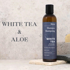 Close-up of Westin bottle label highlighting white tea aloe signature scent