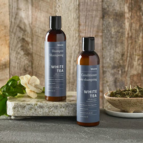 Westin White Tea Aloe shampoo pouring from bottle to show lightweight lather and gentle cleansing benefit
