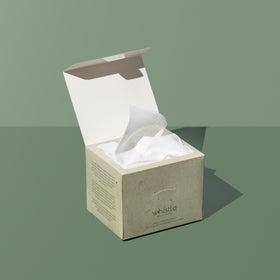 Whistle Wellness resealable box open to display protected, ready-to-use sheets