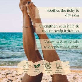 Scoop of White Naturals shea butter on hand showing smooth application and hydration
