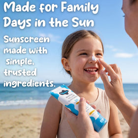 Wildara lotion on a beach towel showing water resistant performance for outdoor and swim days