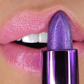Winky Lux amethyst glimmer balm on lips demonstrating hydrating sheen and personalized purple-pink tint