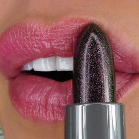 Winky Lux mauve tint swatched on wrist showing pH-reactive personalized color result