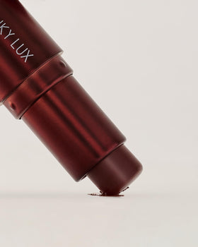 Winky Lux Espresso 'Tini ingredients flatlay highlighting ceramides jojoba and shea benefits