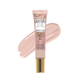 Winky Lux front packaging showing compact concealer tube and branding, clear product identity and appeal