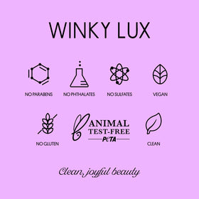 Winky Lux size comparison next to compact to show portable dimensions