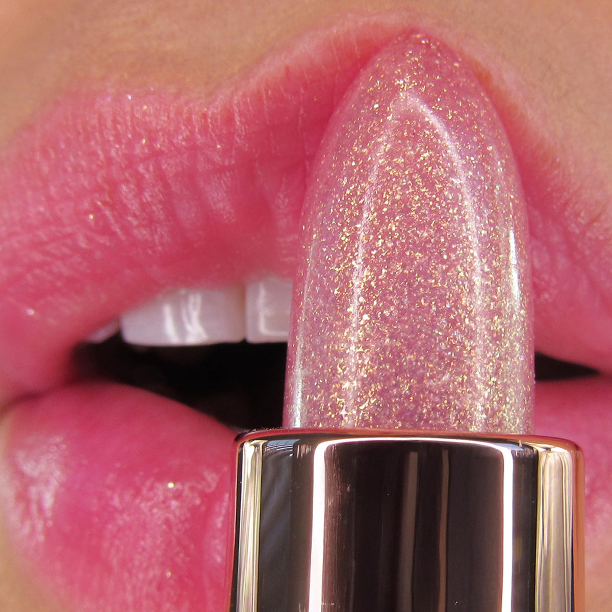 Winky Lux open twist-cap exposing clear balm stick for easy application benefit travel-ready