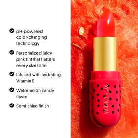 Winky Lux balm on a vanity next to makeup for everyday lifestyle inspiration