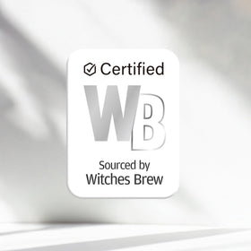 Witches Brew on a vanity with skincare items showing routine integration