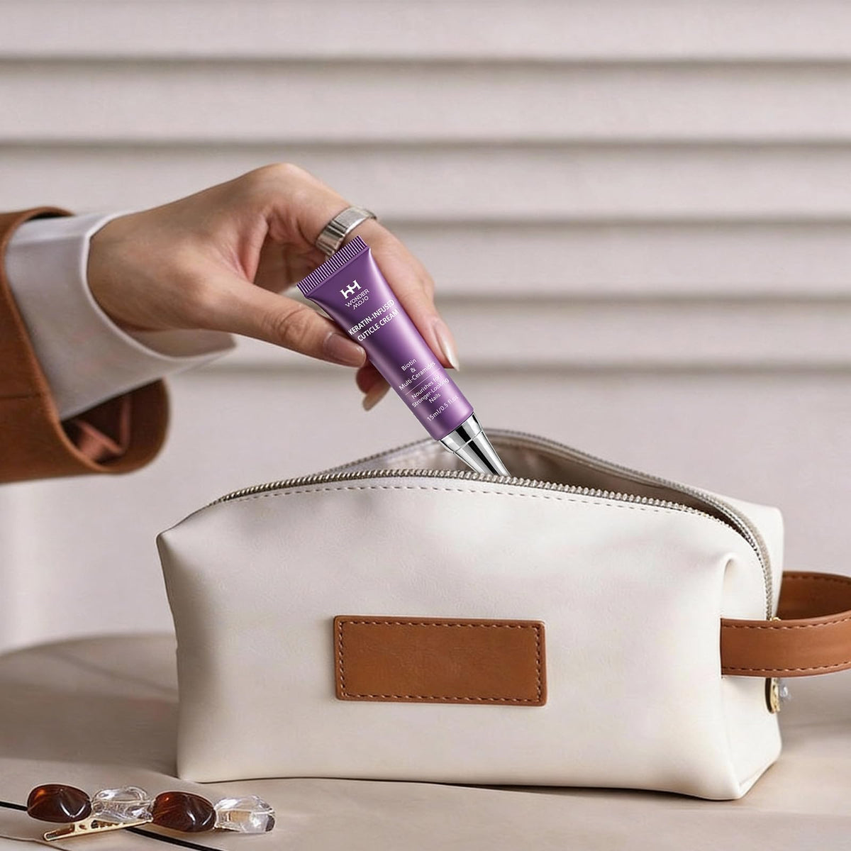 WM WONDER MOJO tucked in a travel pouch for on-the-go cuticle care