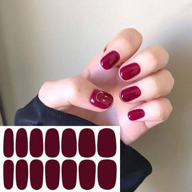 WOKOTO strips on acrylic nails in salon setting showing compatibility and professional use