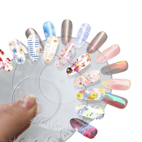 WOKOTO applying foil to nail demonstrating easy transfer technique benefit