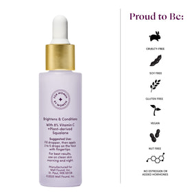 Womaness bottle on bathroom shelf in lifestyle setting, suggests everyday routine ease
