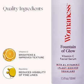 Womaness dropper dispensing clear serum, demonstrates easy application and texture