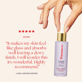 Womaness applying serum to hand, shows fast absorption and smooth hydration
