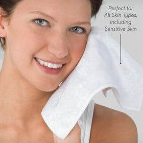 WONDER CLOTH held next to hand showing 10.5 by 8.5 inch size for full-face coverage
