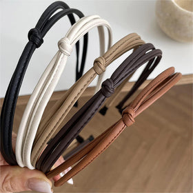 WOVOWOVO front view of five headbands showing neat colors and compact packaging
