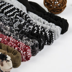 wovowovo scarves packed in travel bag illustrating versatile on-the-go styling