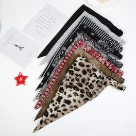 wovowovo hand holding scarf to show scale and easy portability