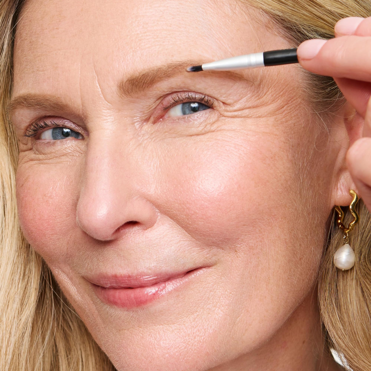 WUNDERBROW in a makeup bag lifestyle shot showing travel-ready convenience