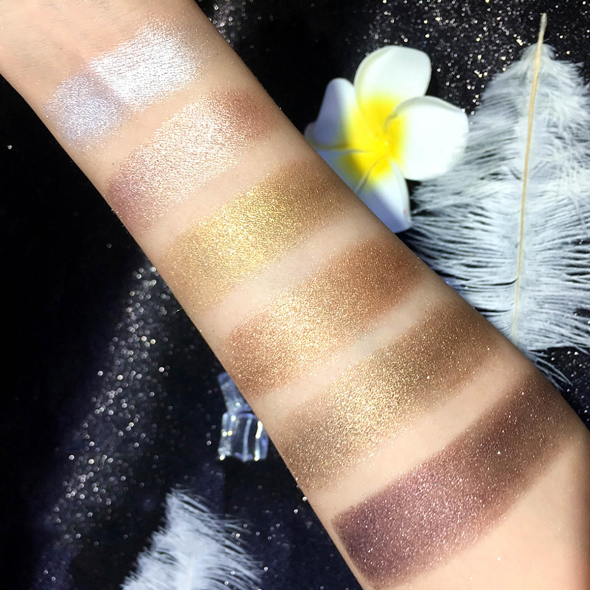 XFEXM palette held in hand to show compact size and travel ease