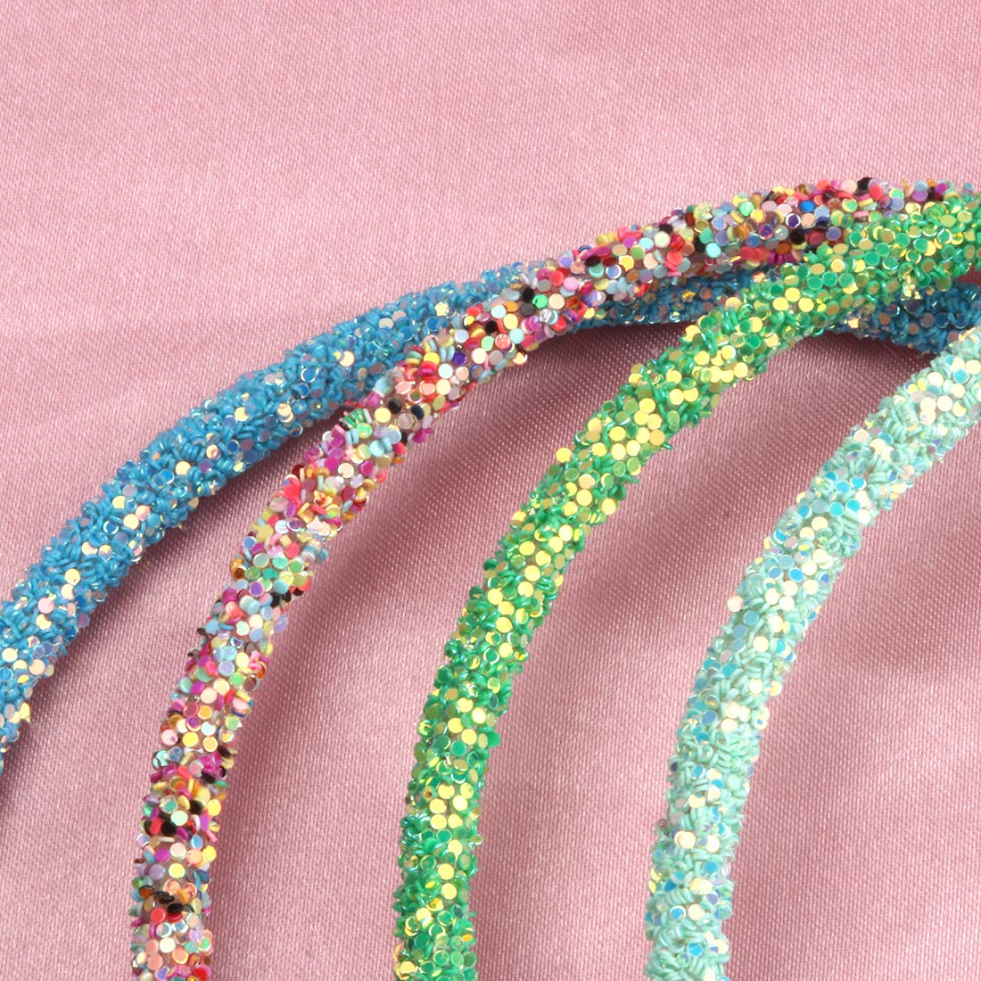 XIMA headband in child's hair keeping hair tidy and comfortable during play