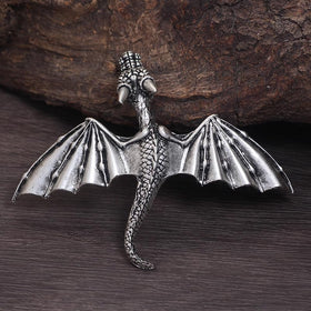 XJYHDY dragon barrette on black fabric, striking costume contrast