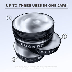 XMONDO styling props with flowers and wood hinting signature scent