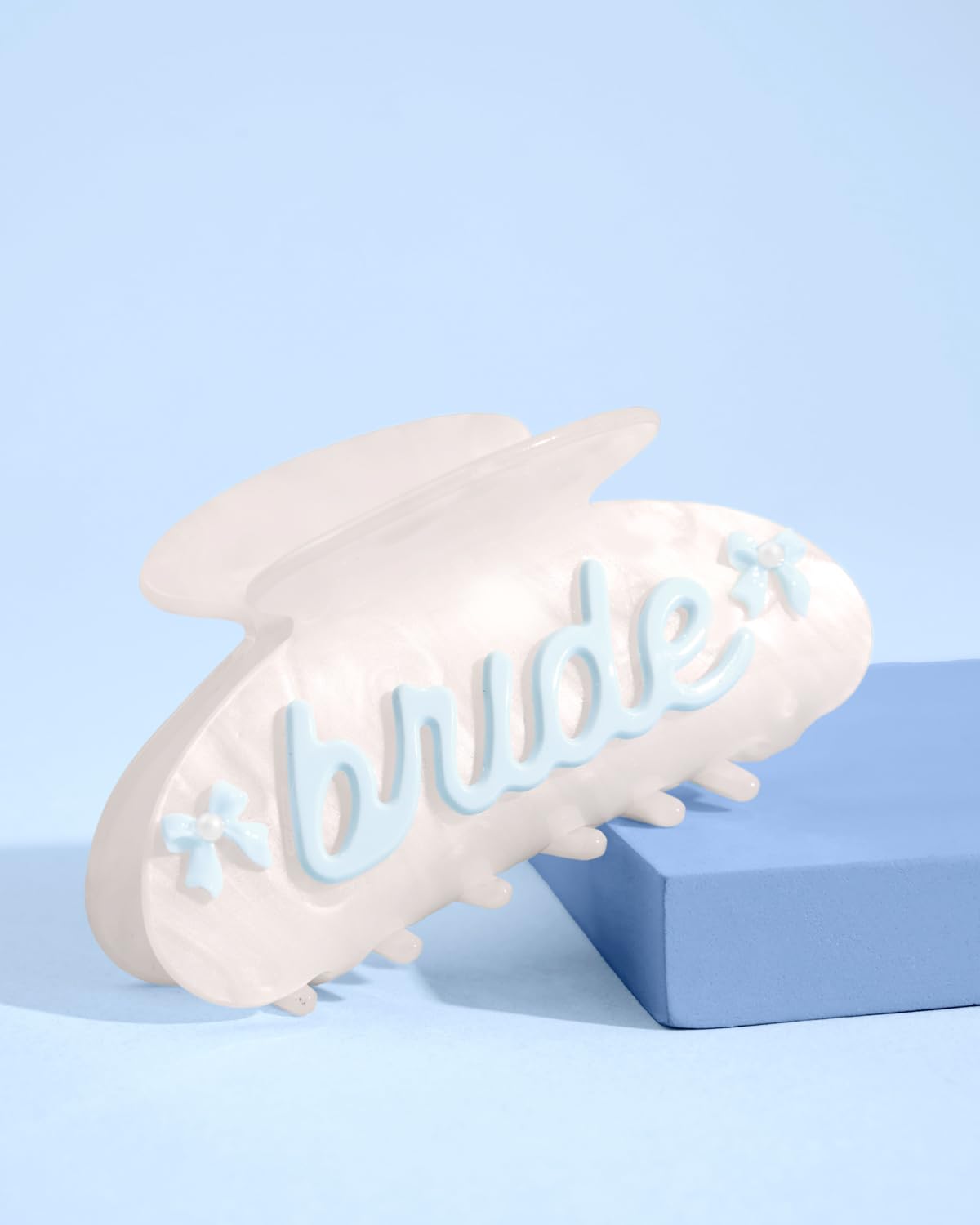 xo, Fetti close detail of cursive bride lettering highlights delicate design
