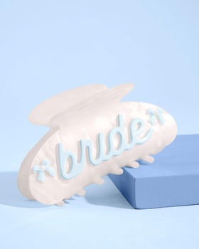 xo, Fetti close detail of cursive bride lettering highlights delicate design