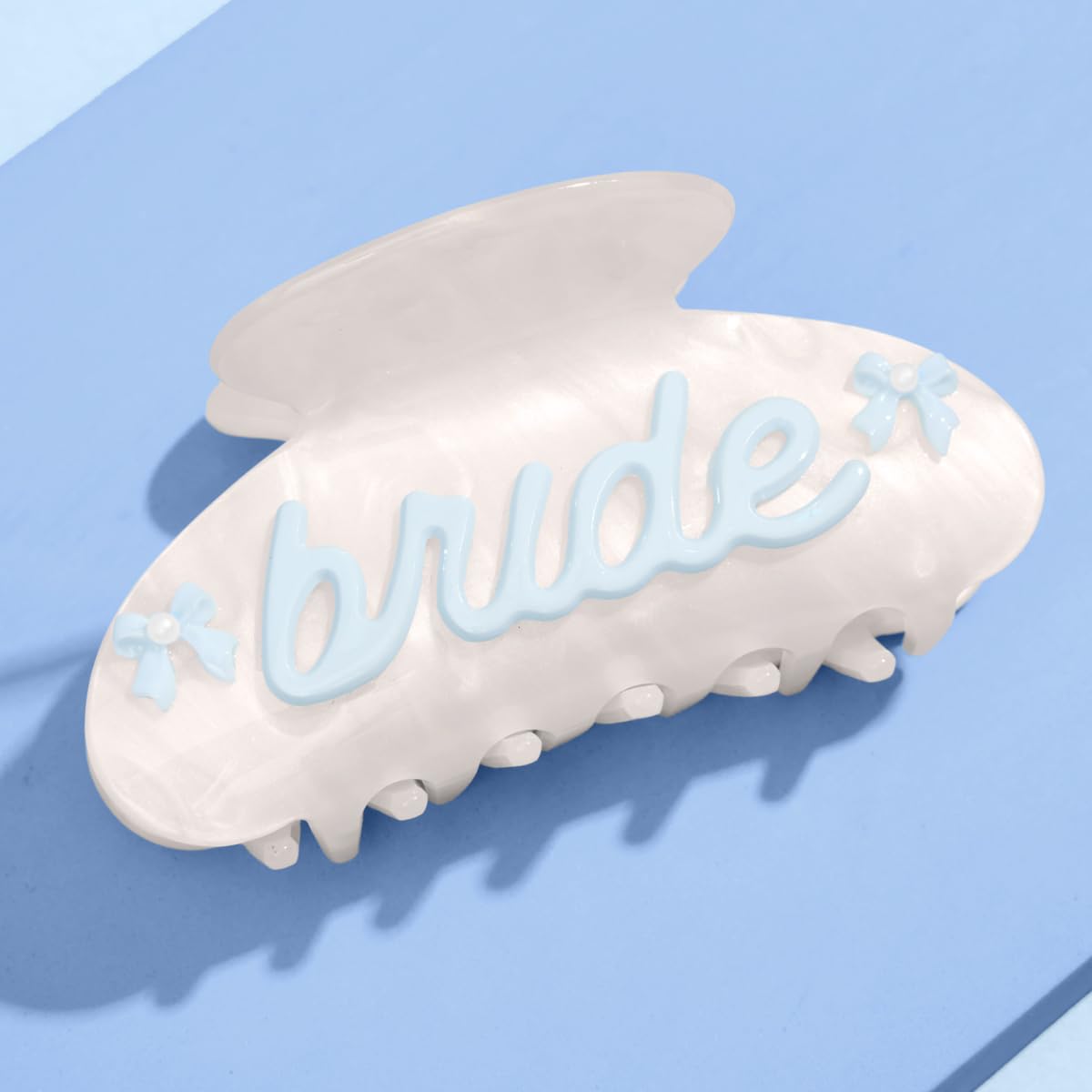 xo, Fetti front view of bride claw clip shows marble finish and secure grip
