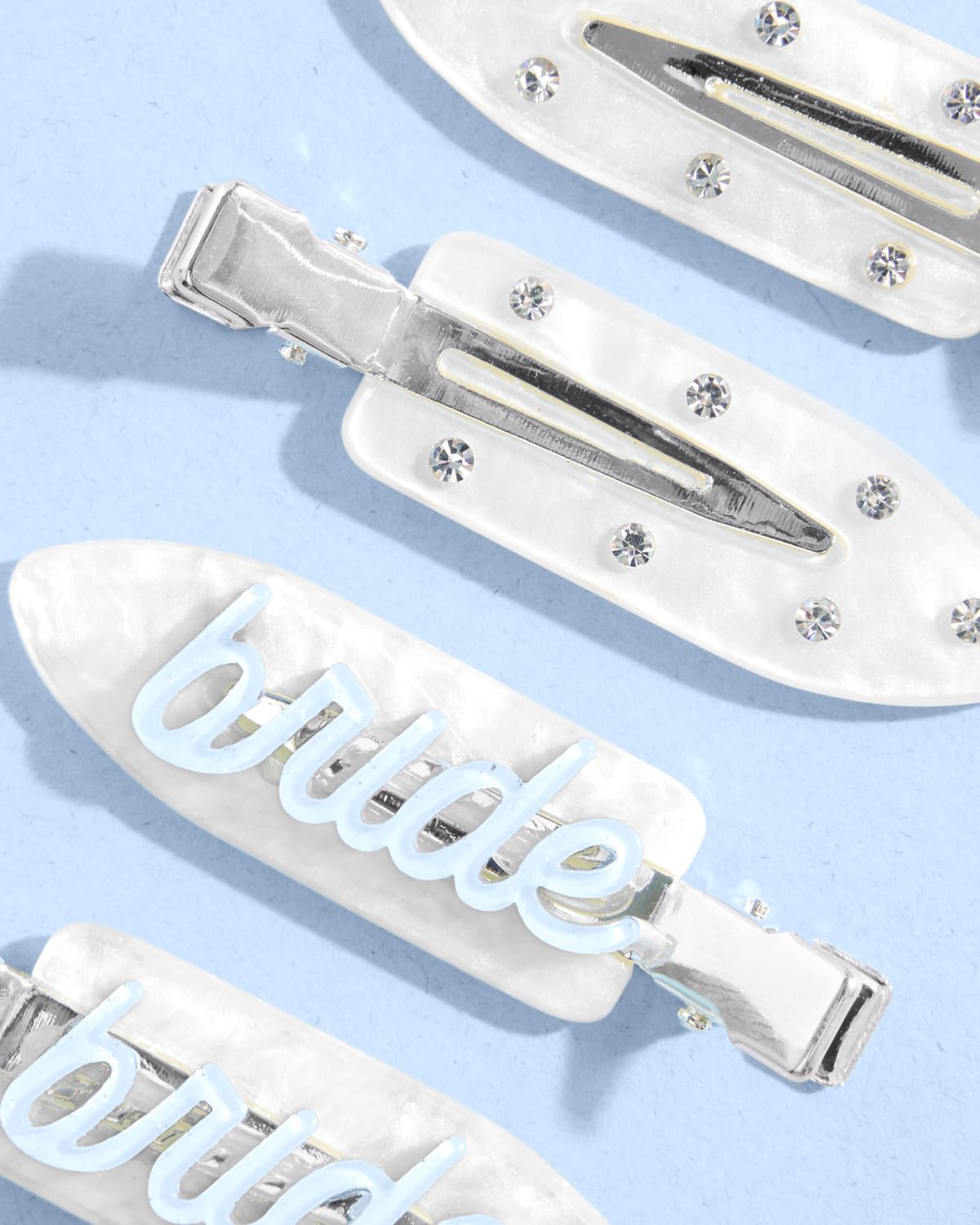 xo, Fetti close detail of rhinestones showing sparkle that elevates bridal looks benefit