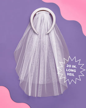 xo, Fetti close-up of pearl embellishments highlighting elegant shine