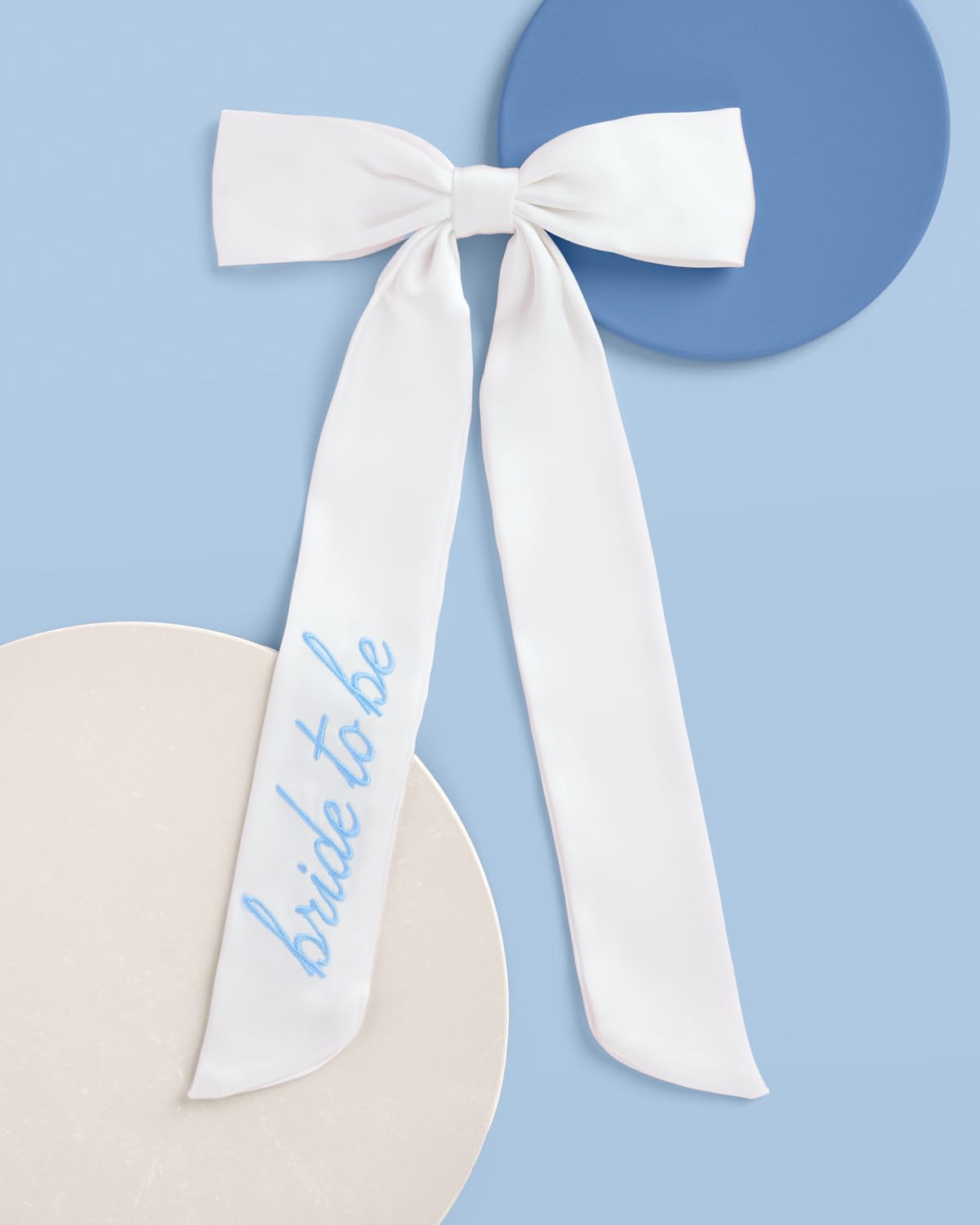 xo, Fetti blue embroidery close-up shows elegant detail