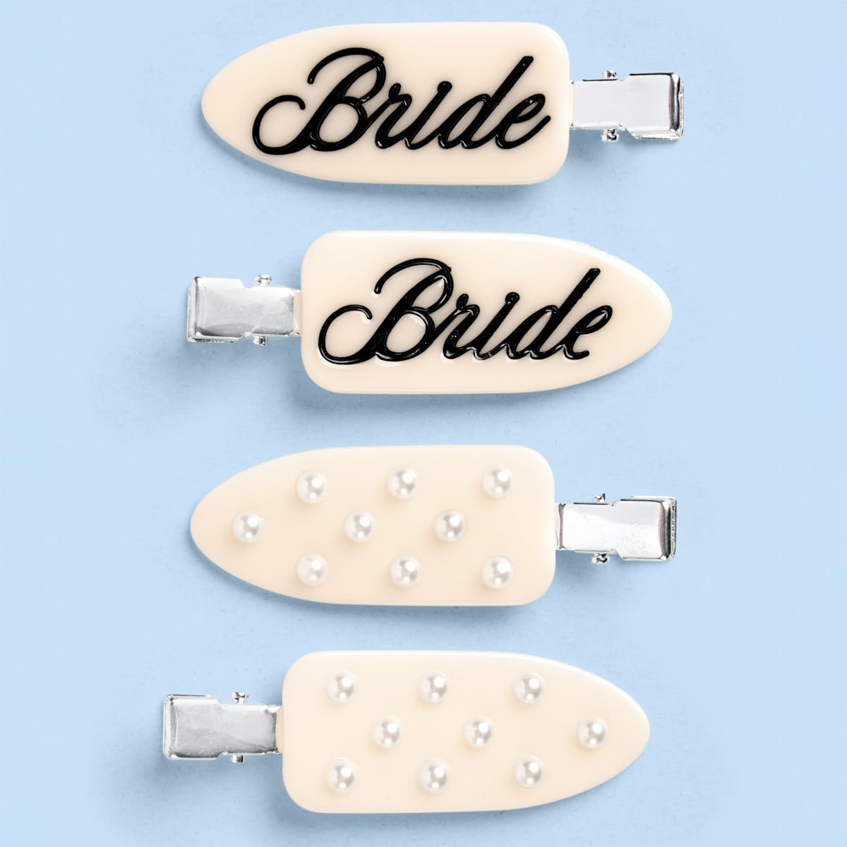 xo, Fetti front view of four-piece ivory clip set adds polished finish