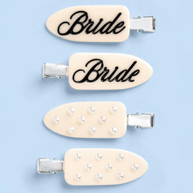 xo, Fetti front view of four-piece ivory clip set adds polished finish