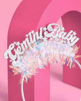 xo, Fetti detail of iridescent fringe adding motion and light reflection