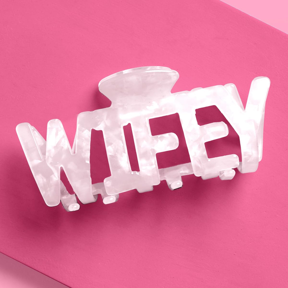xo, Fetti front view of white marble claw showing glossy bridal finish and polish