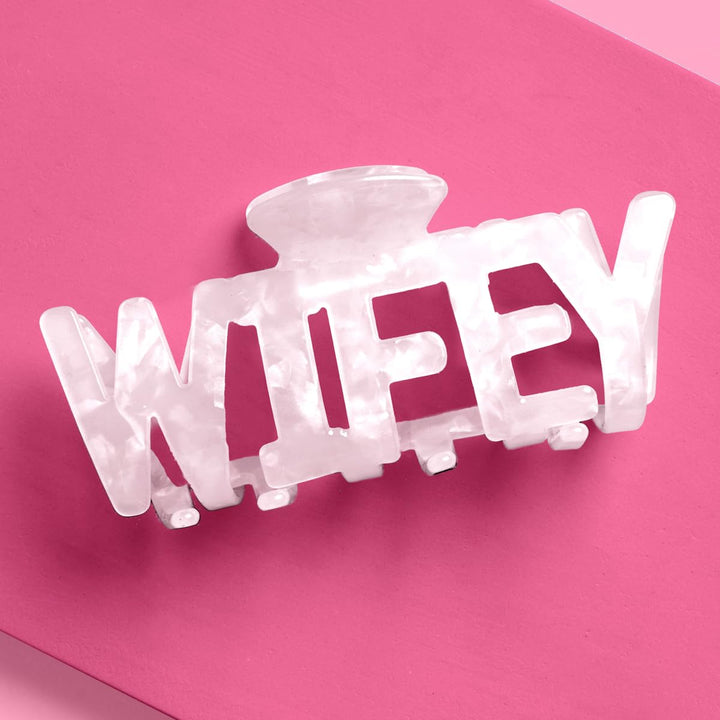xo, Fetti front view of white marble claw showing glossy bridal finish and polish