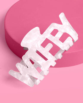 xo, Fetti styled at bachelorette brunch showing wearable bridal charm