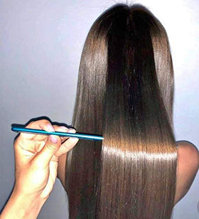 YSSER Evans hair texture after treatment showing smoother shine
