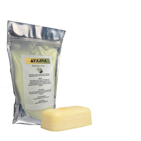 Yajna shea butter being spread on hand demonstrating immediate softening